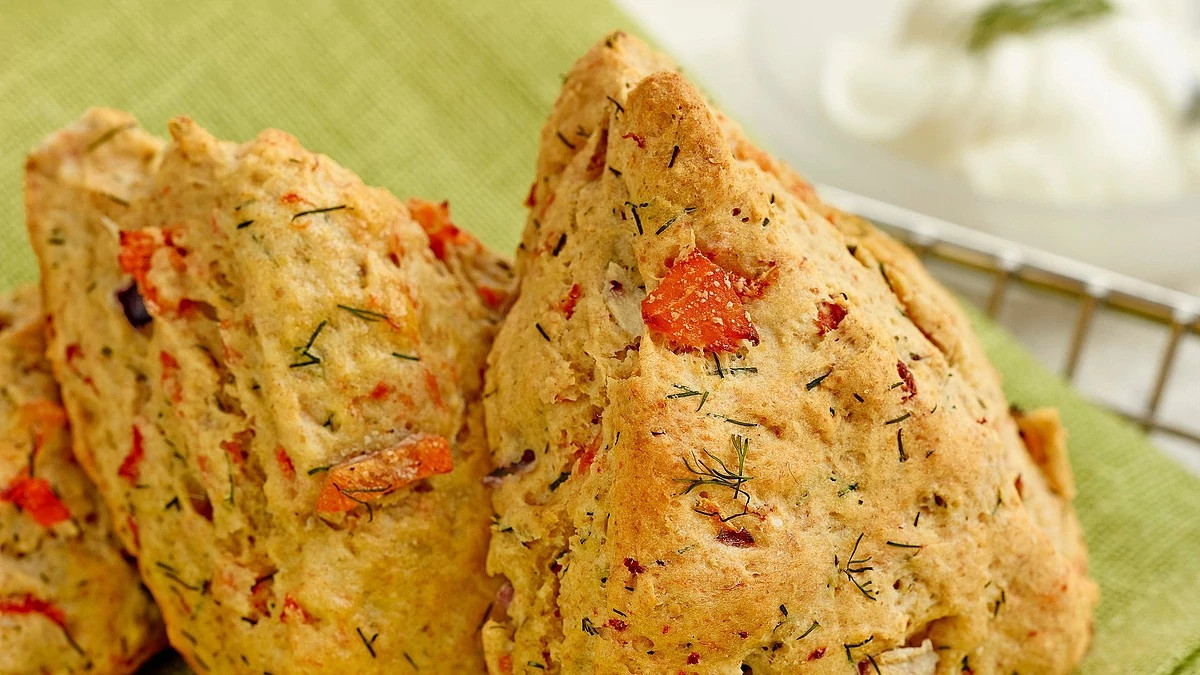 A close-up view of smoked salmon and dill scones