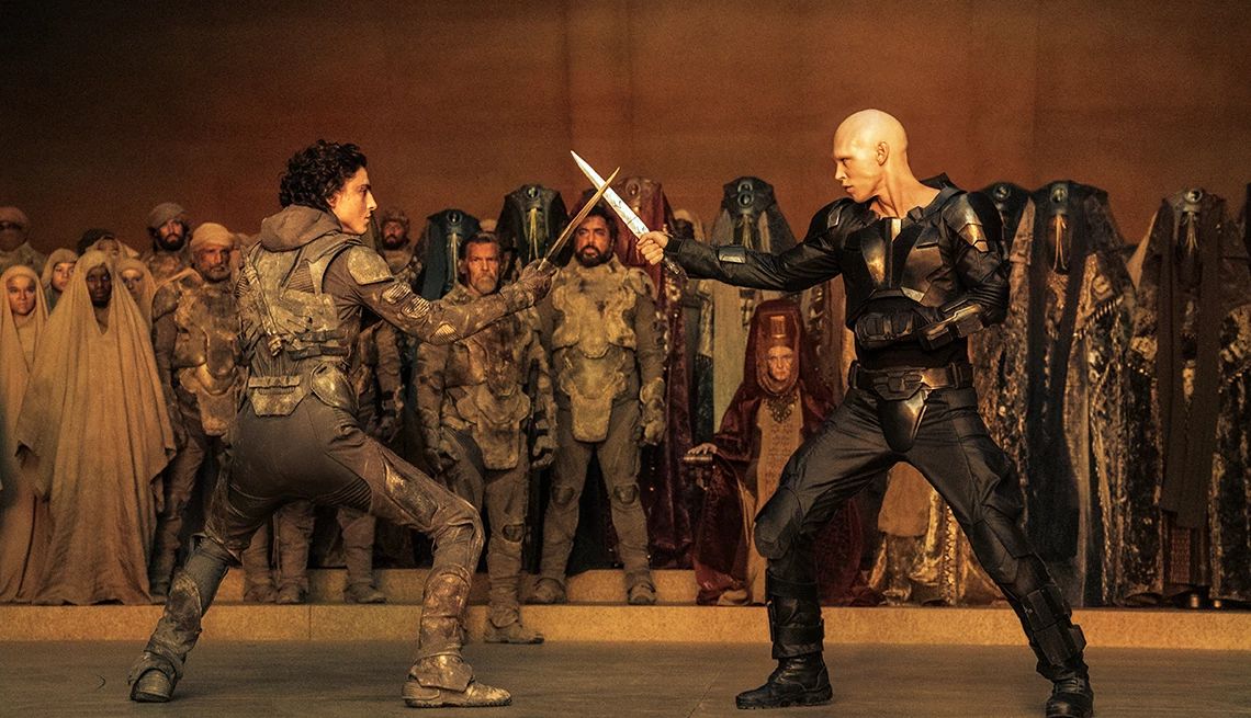 Timothée Chalamet and Austin Butler each holding a knife as they face off in a fight in "Dune: Part Two." Timothée Chalamet and Austin Butler each holding a knife as they face off in a fight in "Dune: Part Two."