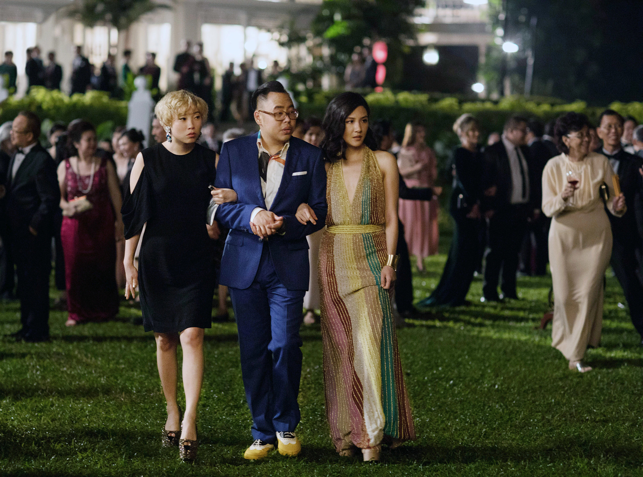 Awkwafina, Nico Santos and Constance Wu in a still from Crazy Rich Asians
