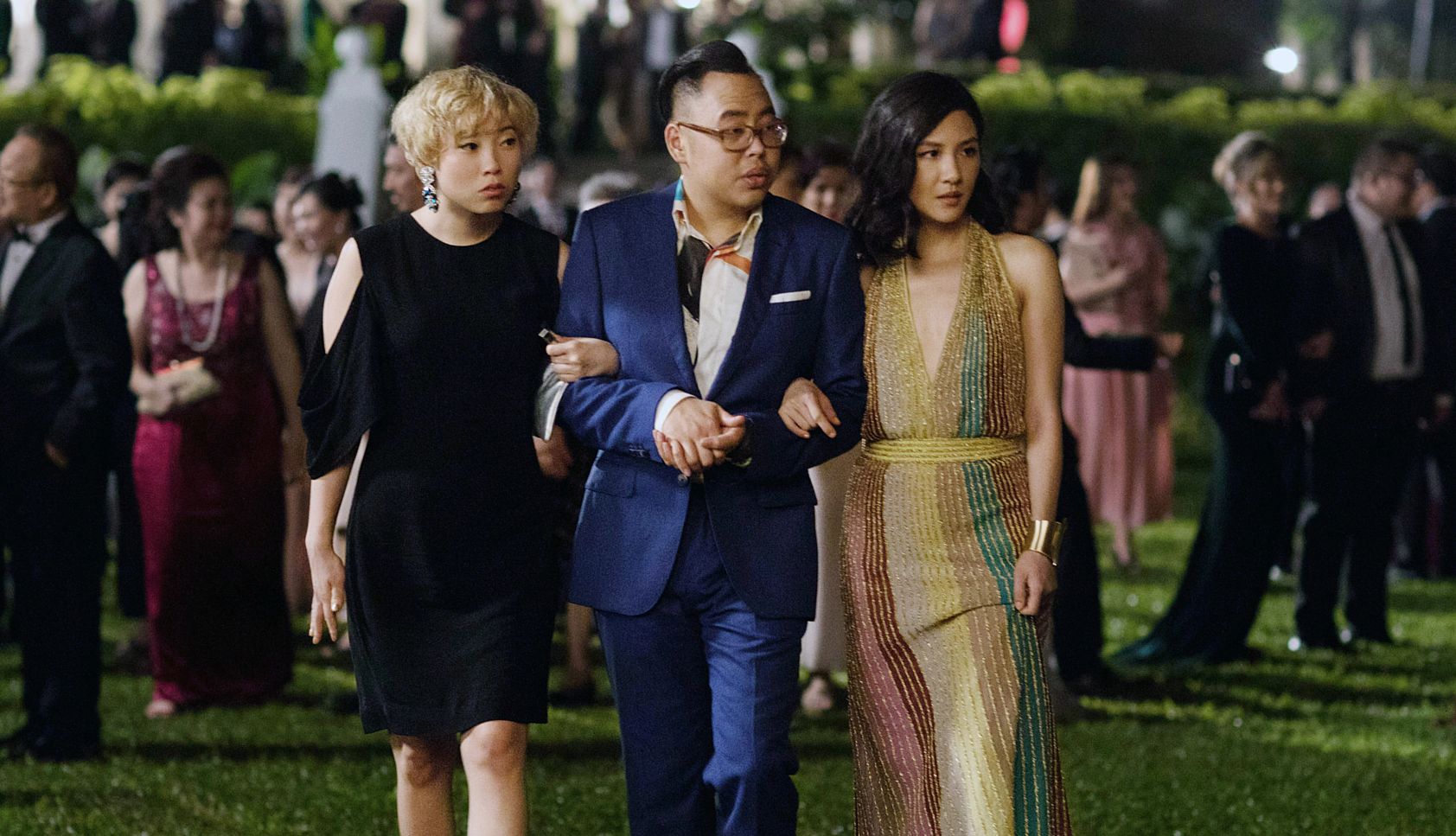 Awkwafina, Nico Santos and Constance Wu in a still from Crazy Rich Asians
