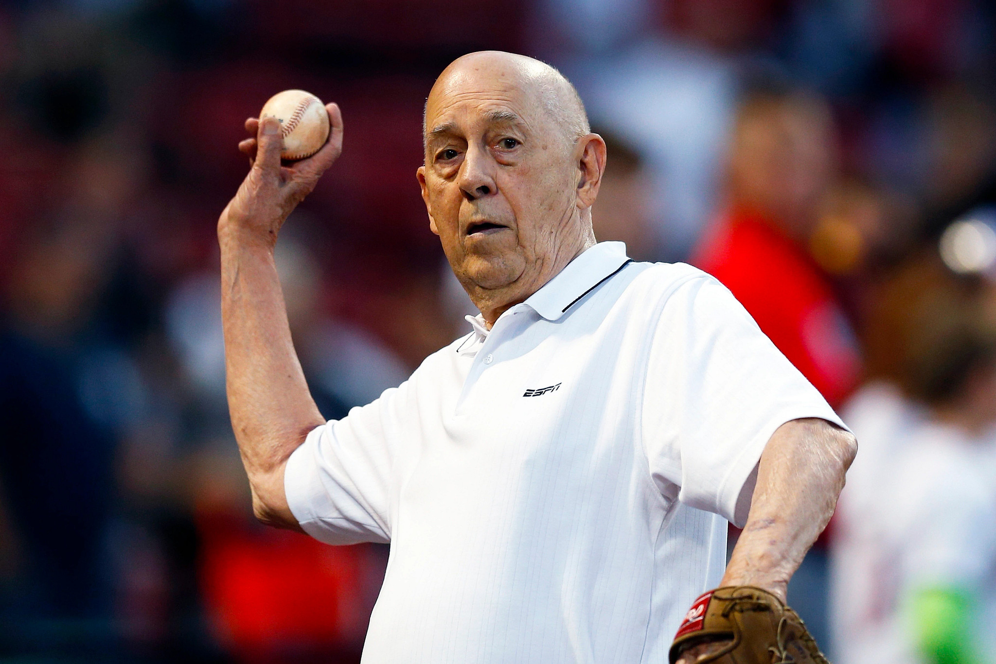bill rasmussen throwing a baseball