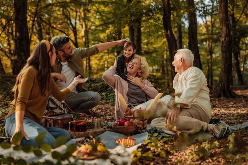 Family doing a picnic in the fall