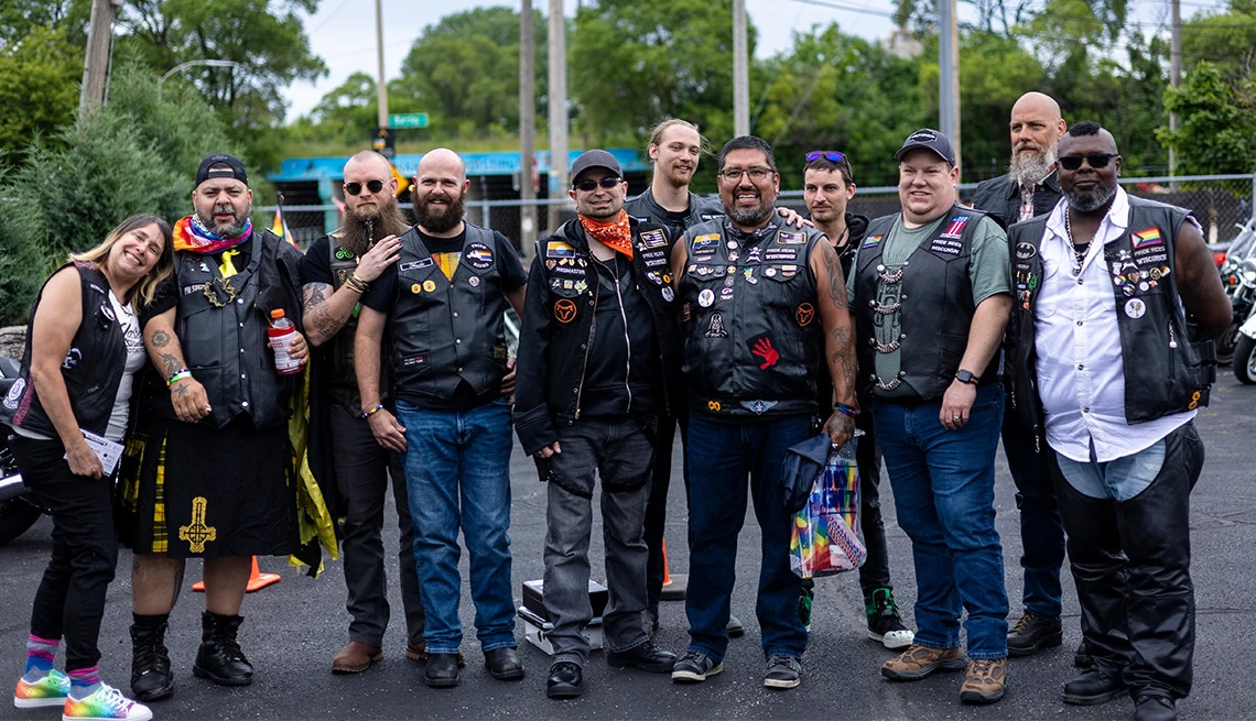 people taking a picture at a pride event