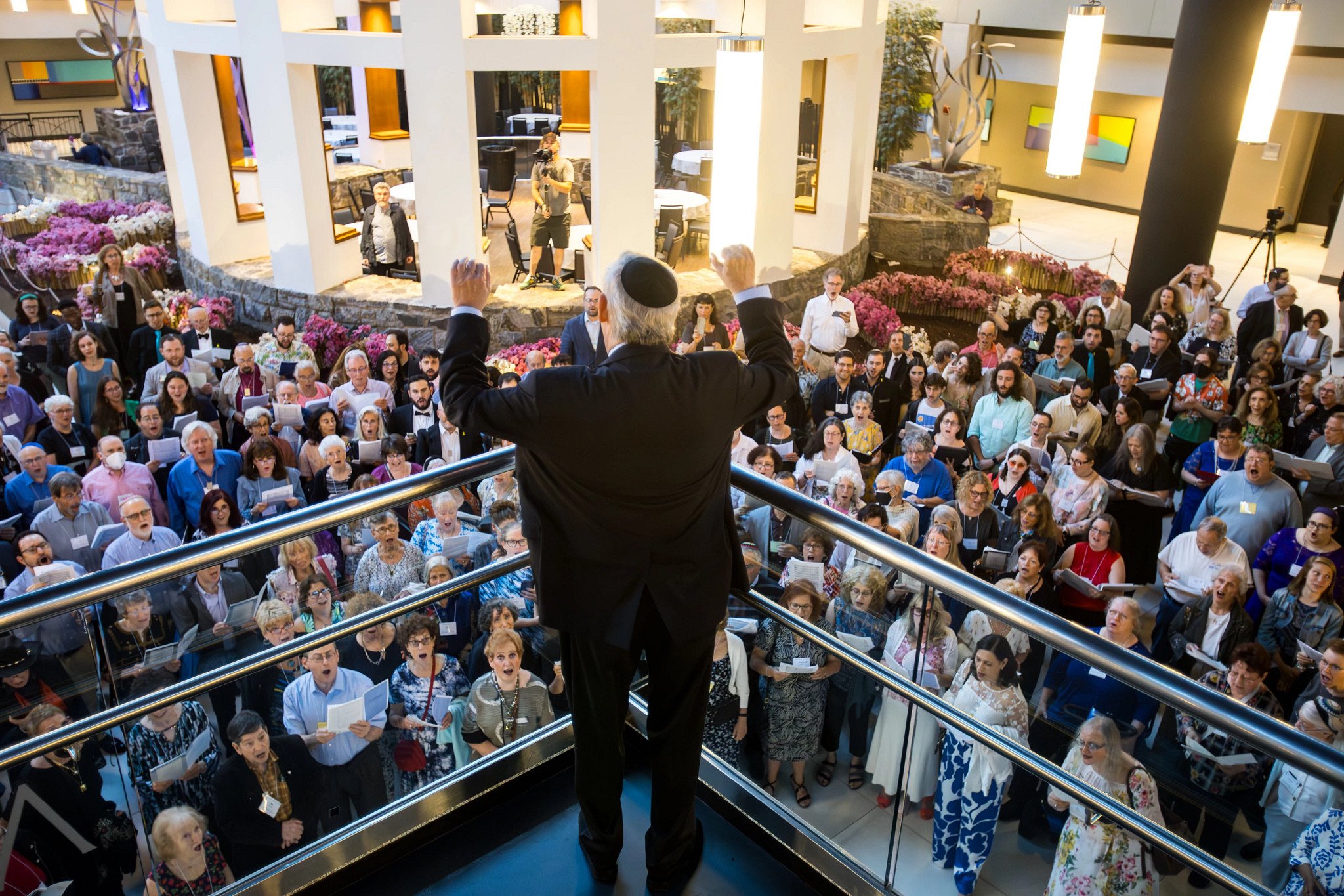 a large group singing at a jewish festival