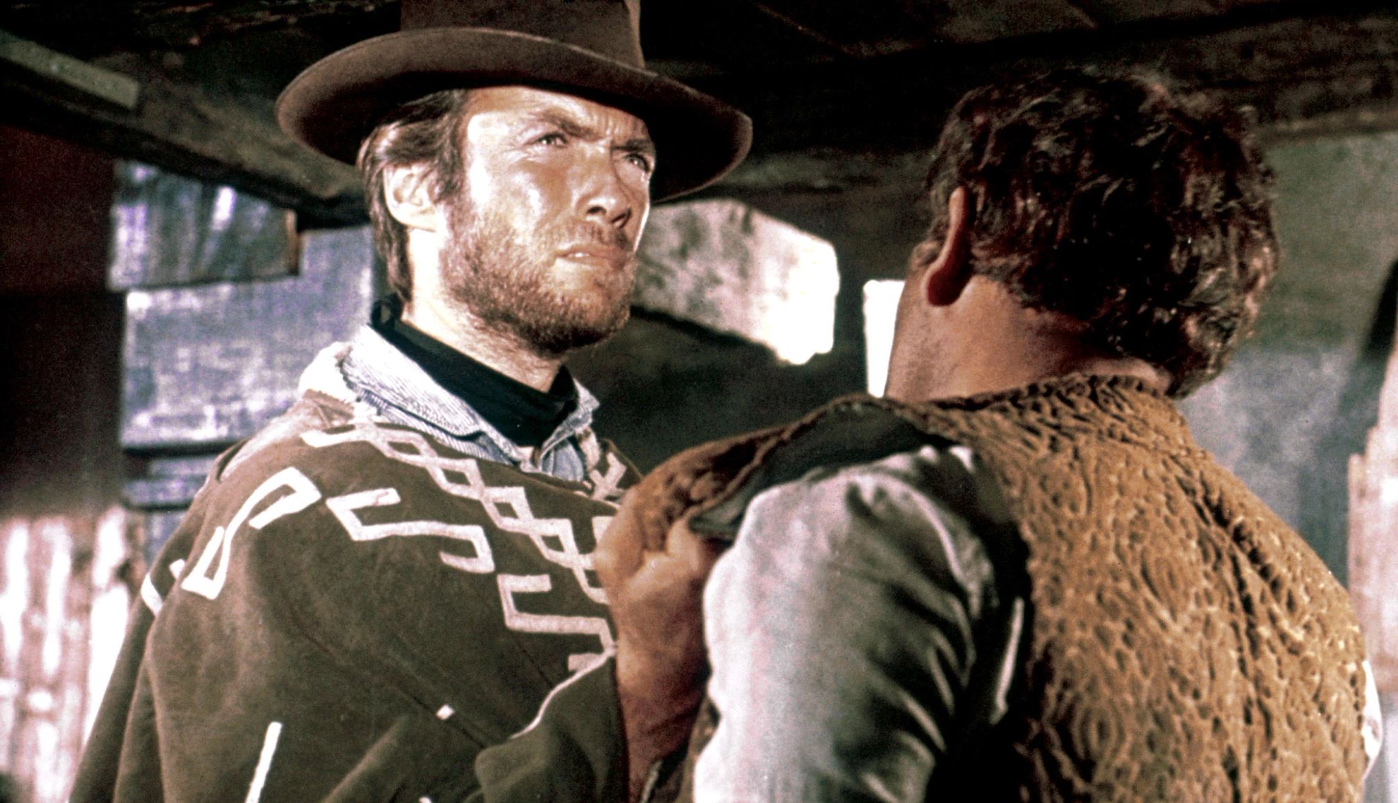 Clint Eastwood (a la izquierda) protagoniza "For a Few Dollars More".
