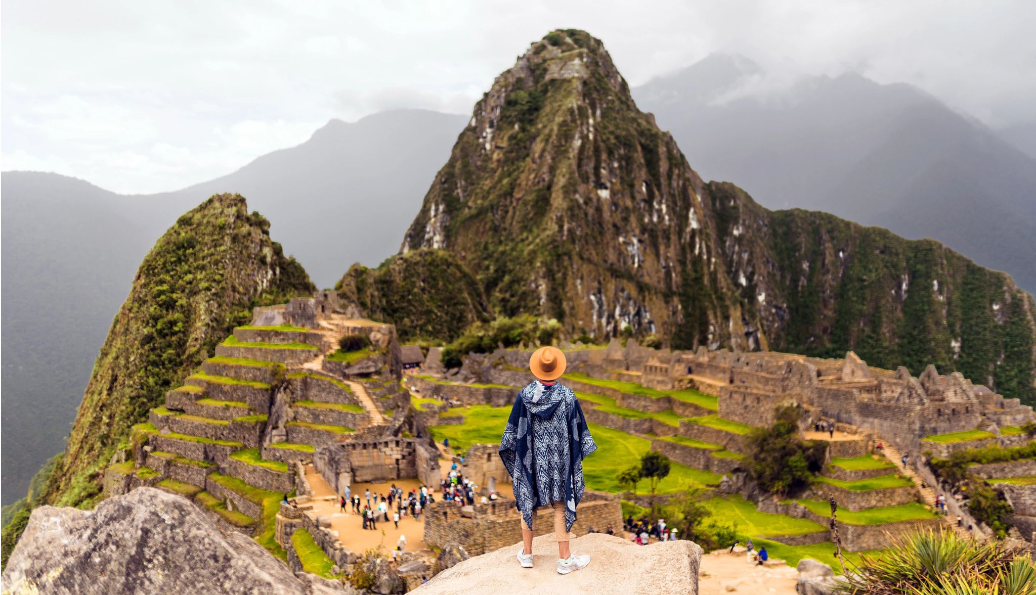 Diane Butler thought a trip to Peru was worth it aerial photo of a woman looking at Machu Picchu