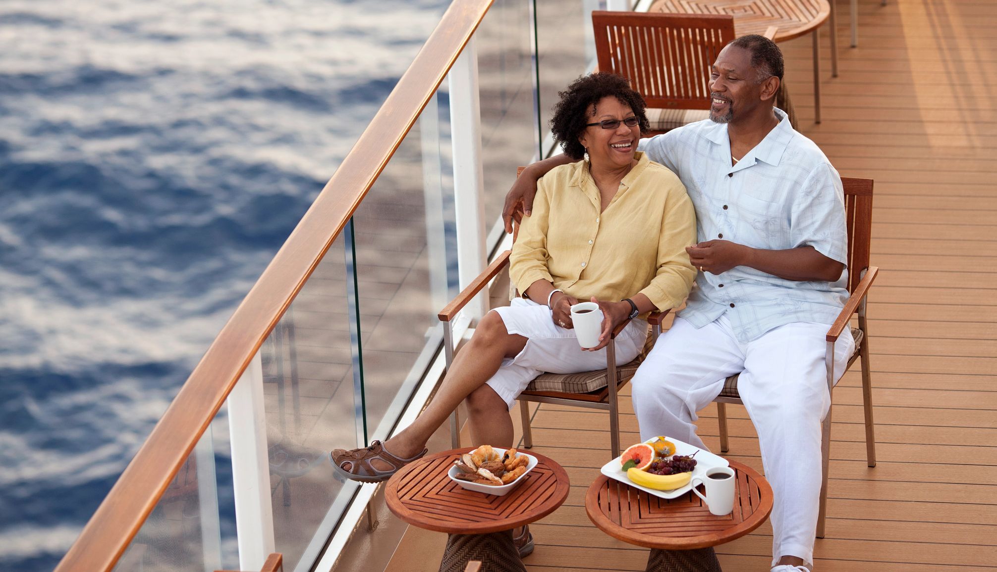 Cruise Through the African Diaspora two people sitting on the deck of a cruise ship