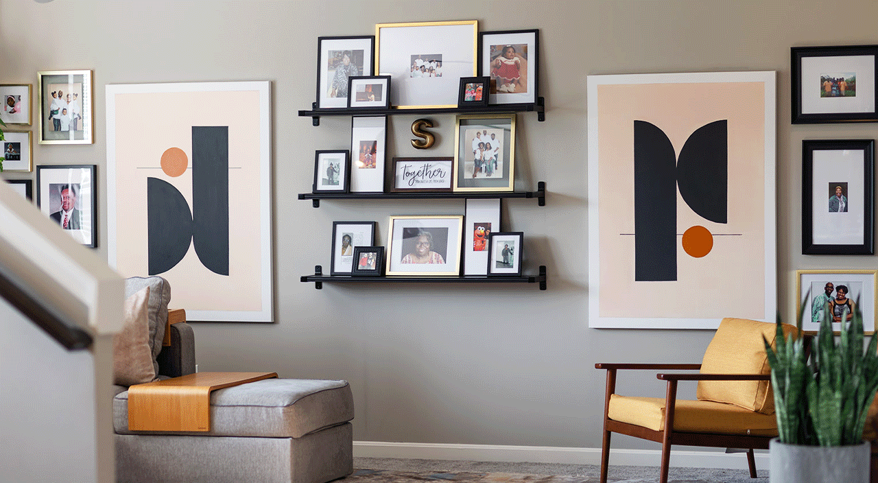 gif of photos of DIY gallery wall with family photos and artworks