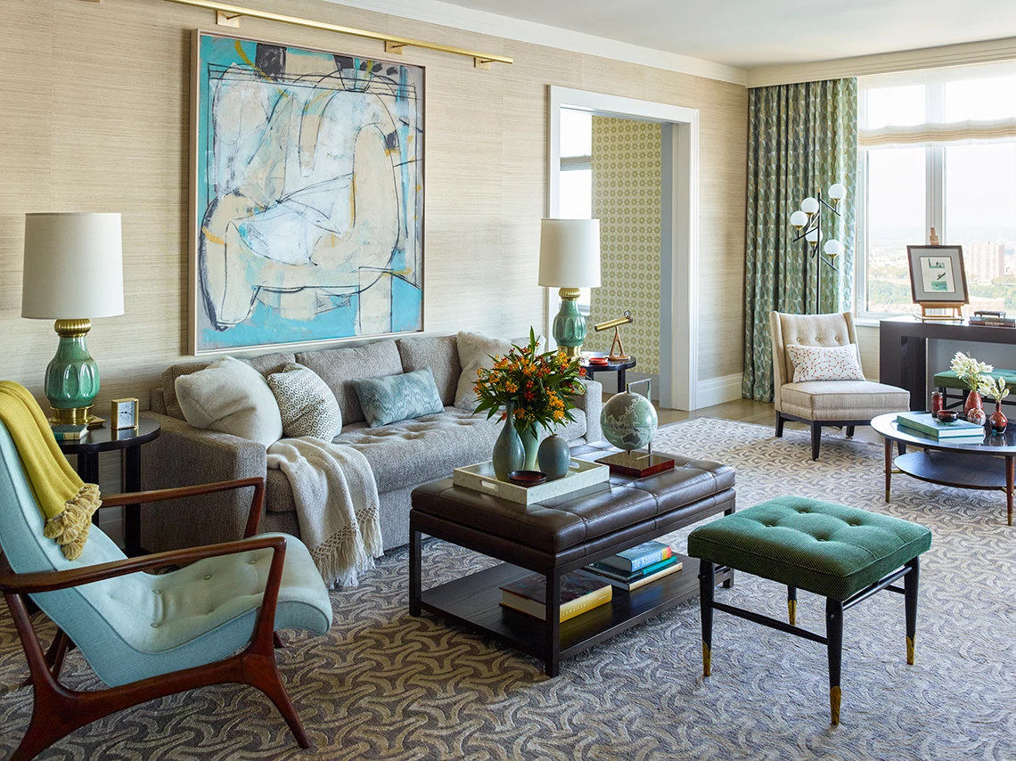 a living room with teal decor