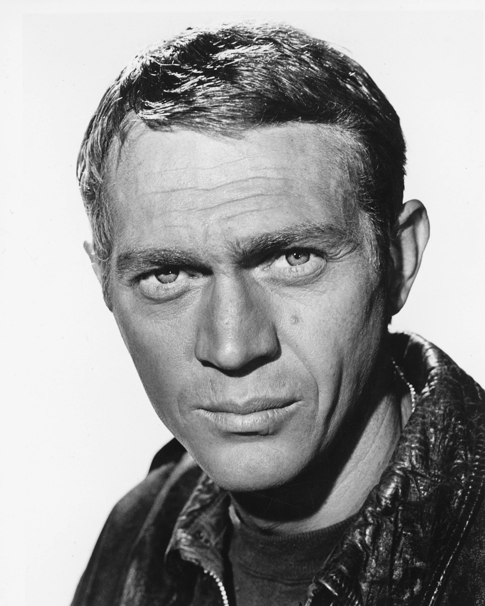 Steve McQueen looking at a camera
