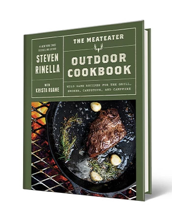Cookbook that says The MeatEater Outdoor Cookbook, Steven Rinella with Krista Ruane; steak in pan on cover