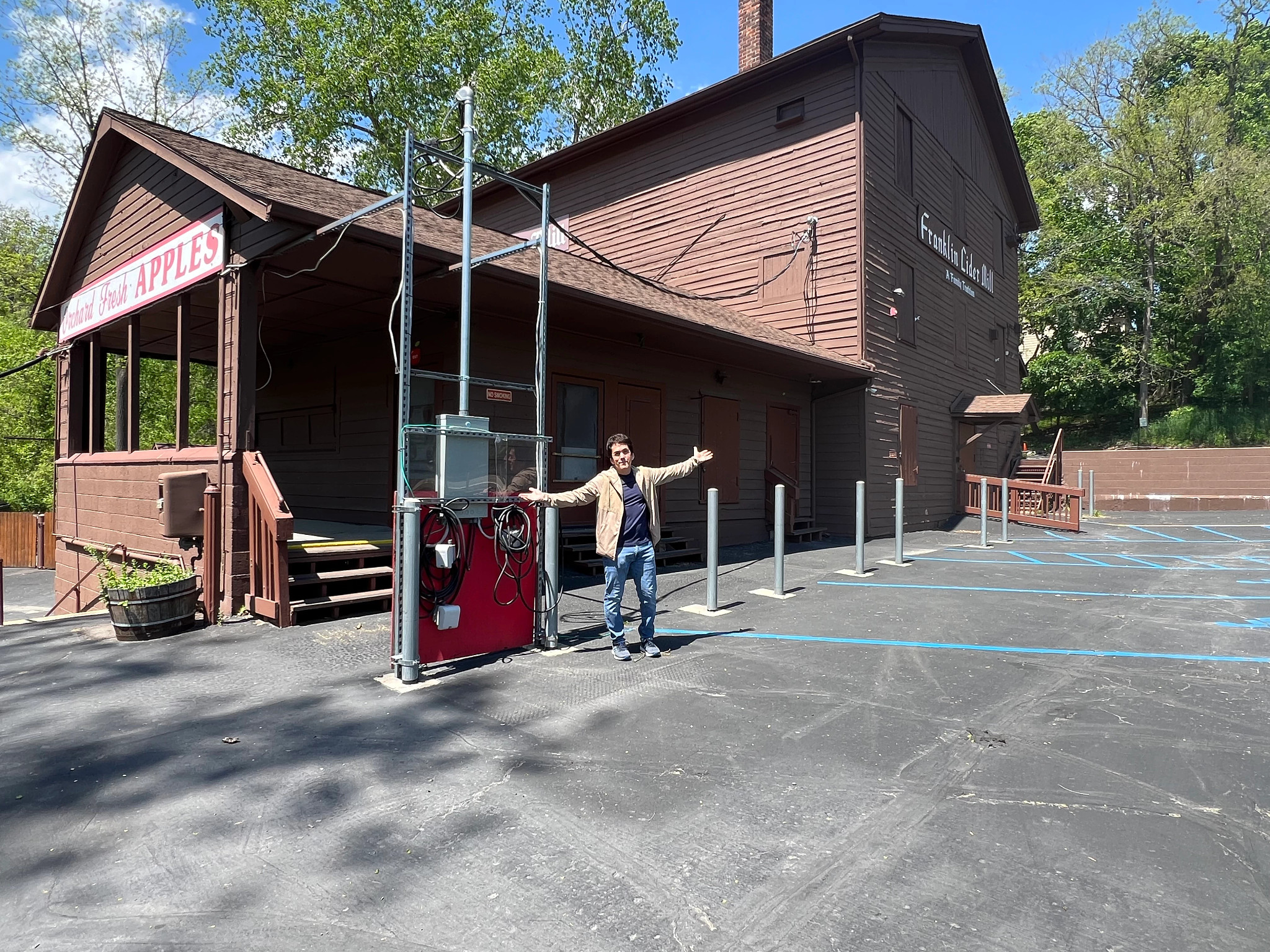 Mitch Albom outside of Franklin Cider Mill
