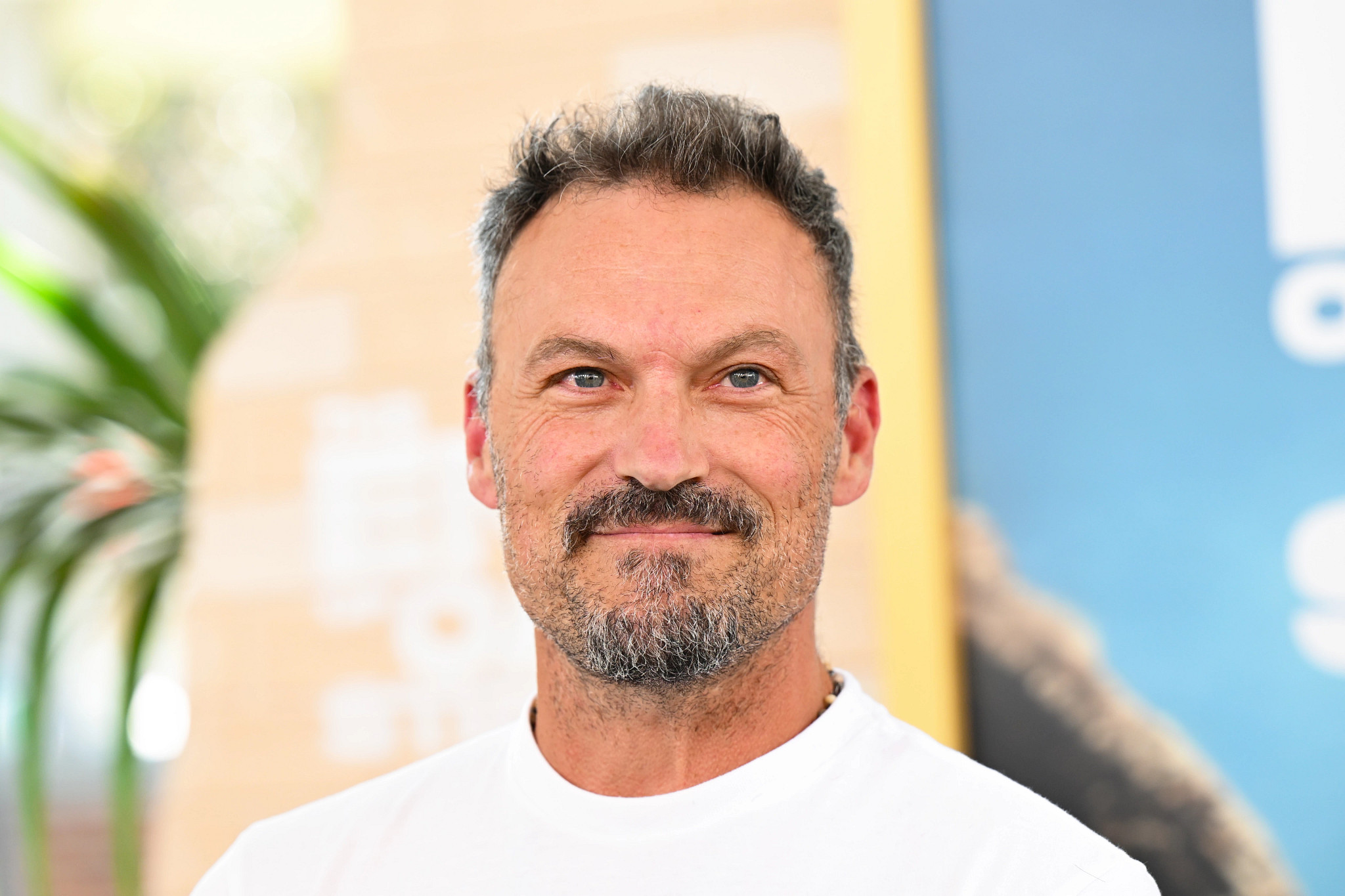 Brian Austin Green in a close up photo with a neutral expression