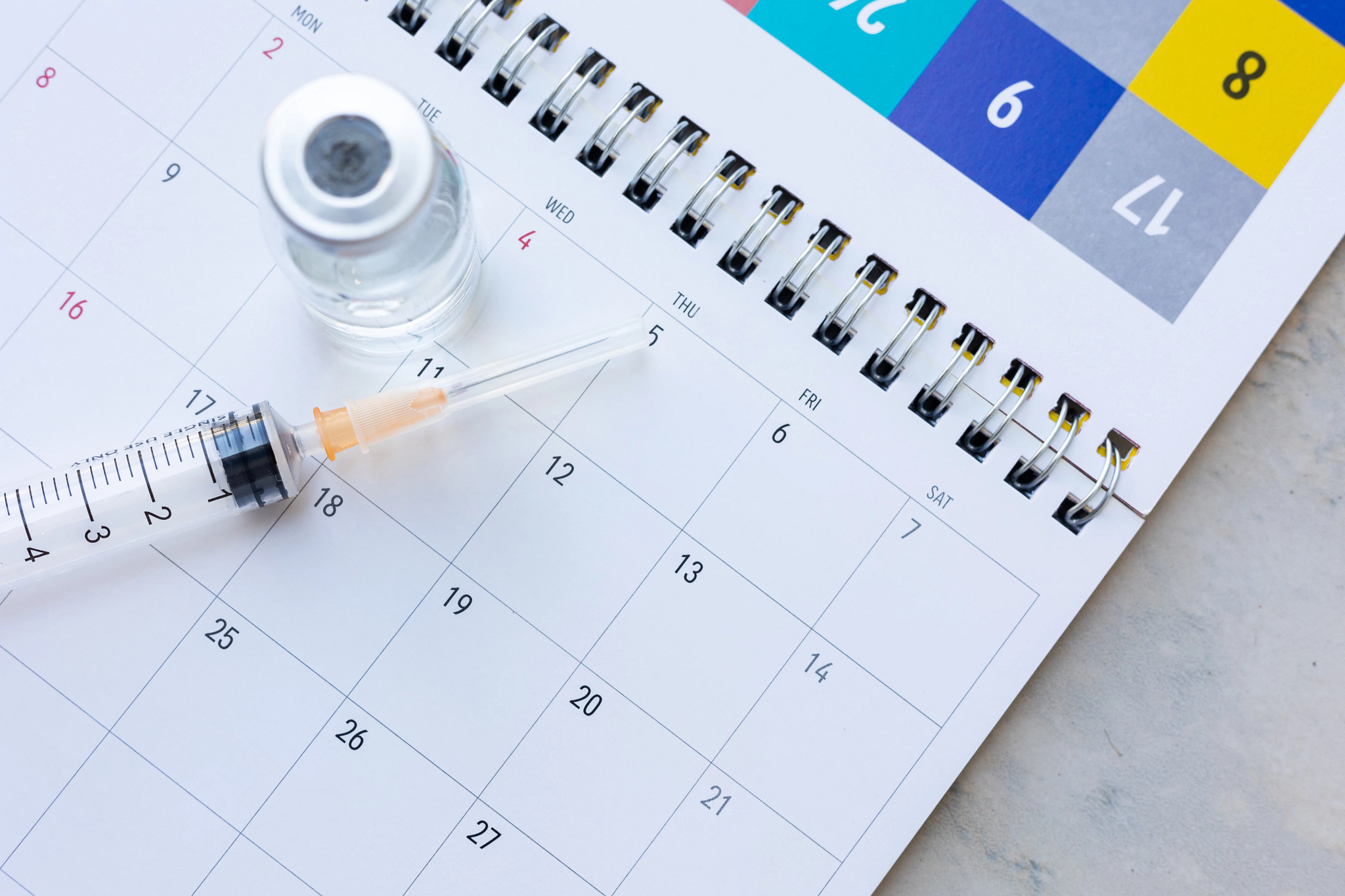syringe and calendar
