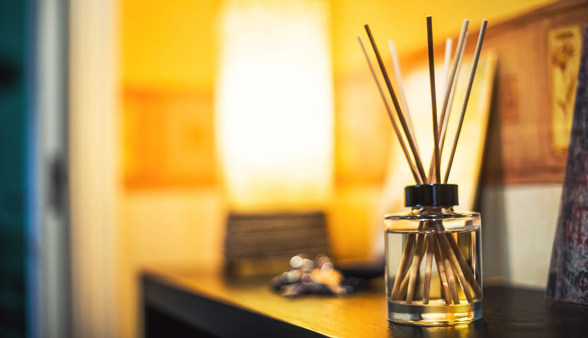 make sure your rental smells great a diffuser on a countertop