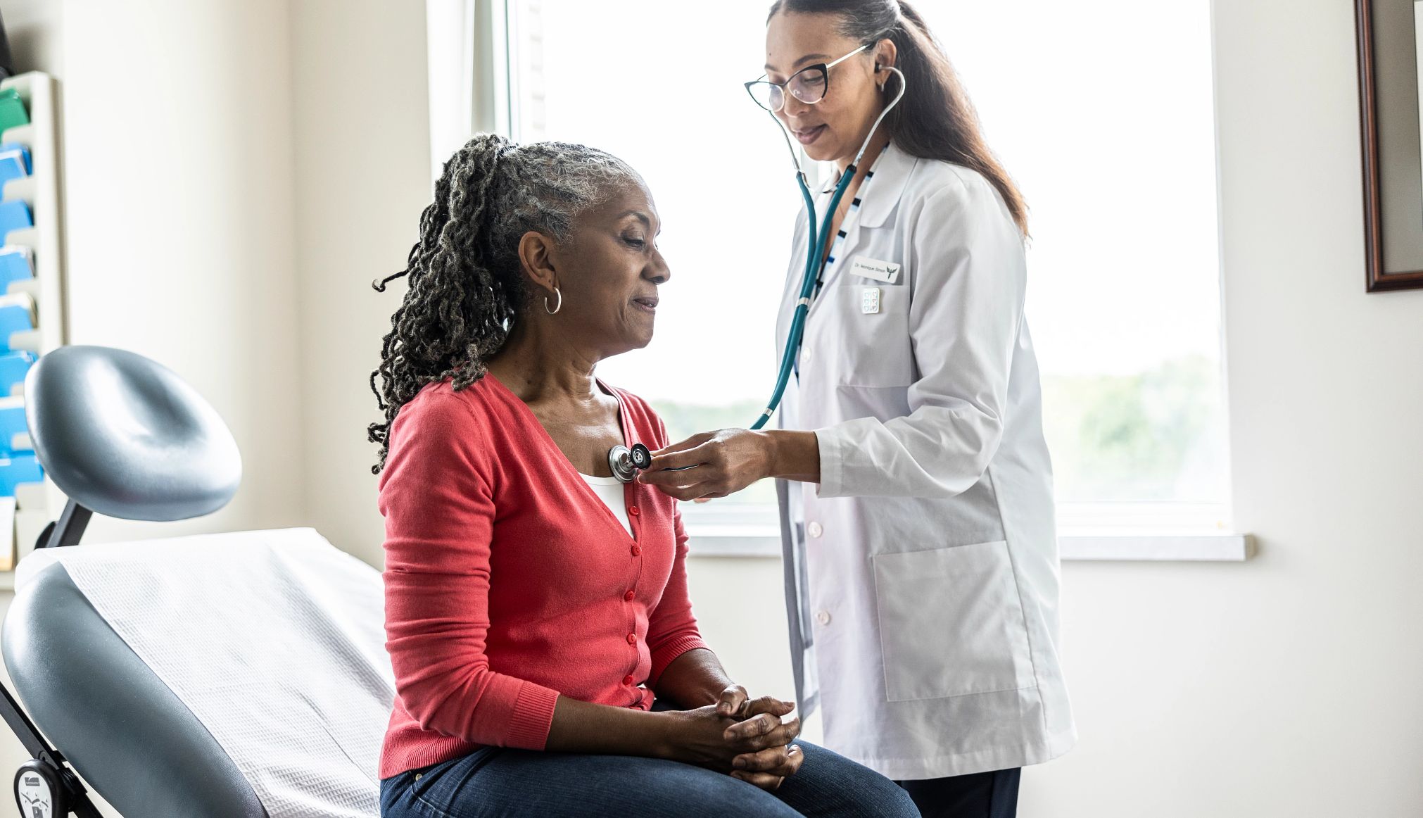 Doctor's Office Mistakes woman having her heartbeat checked at the doctor