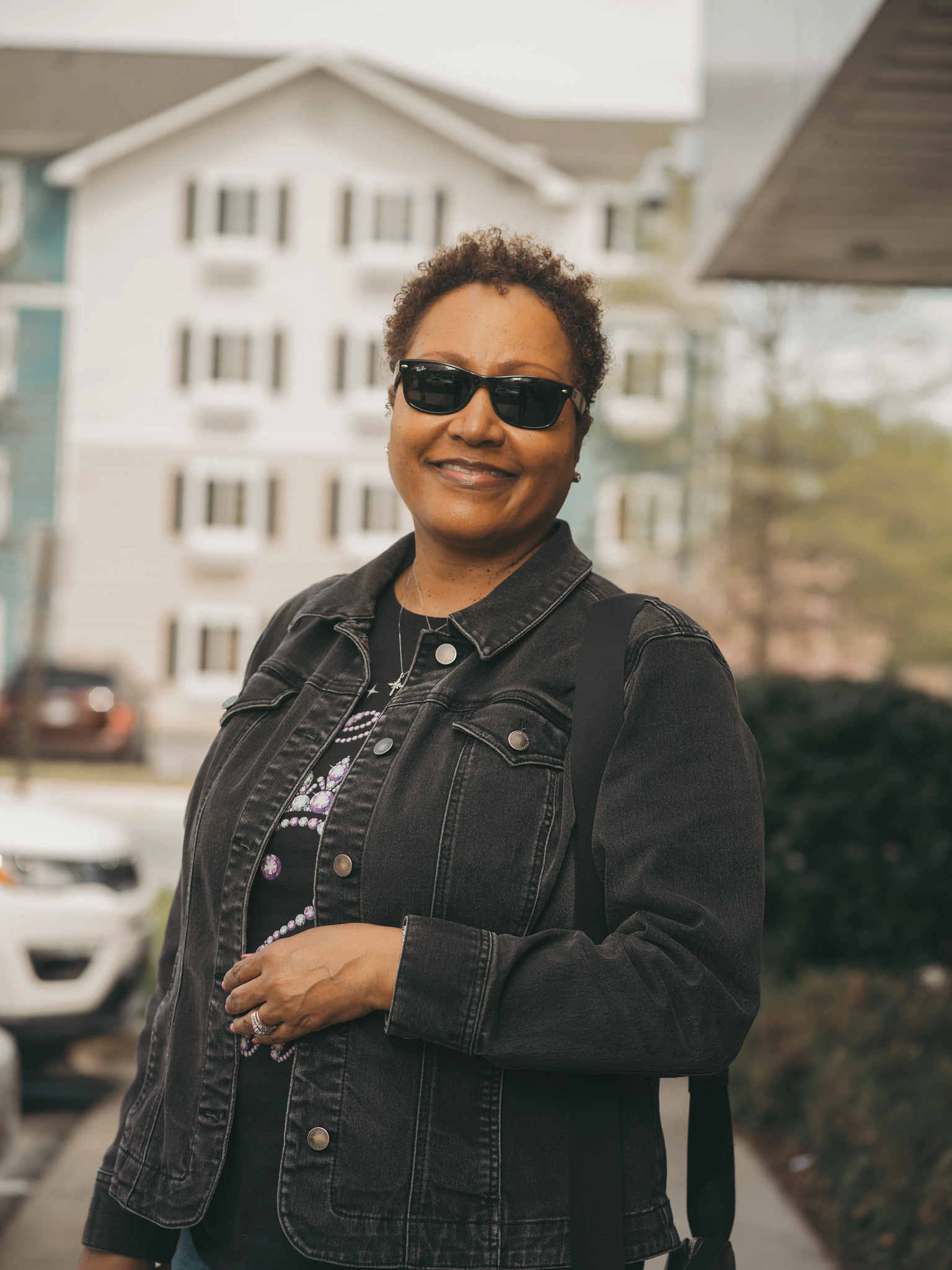 crystalyn gale wears sunglasses and a black jacket 