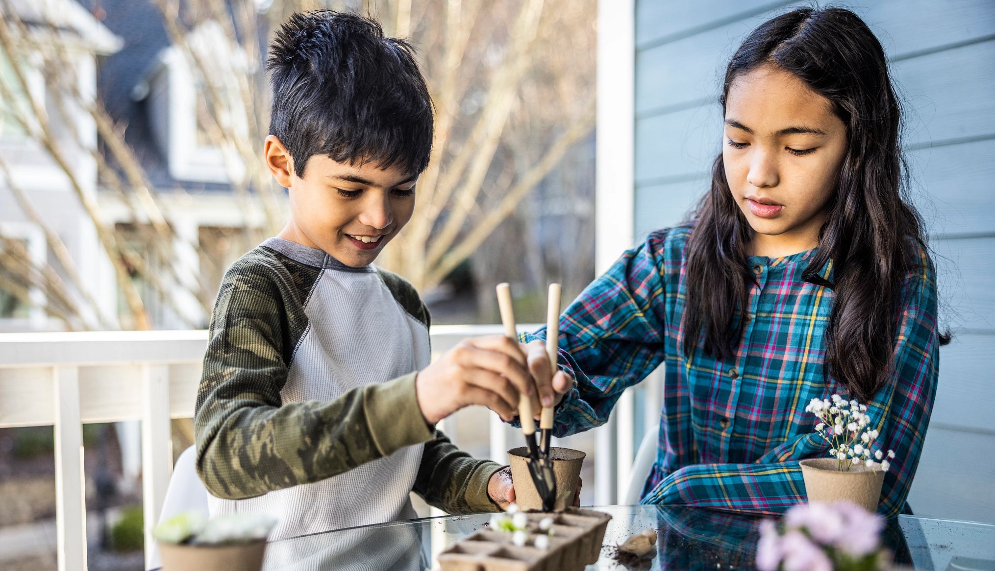 tips for gardening with grandkids two young kids gardening