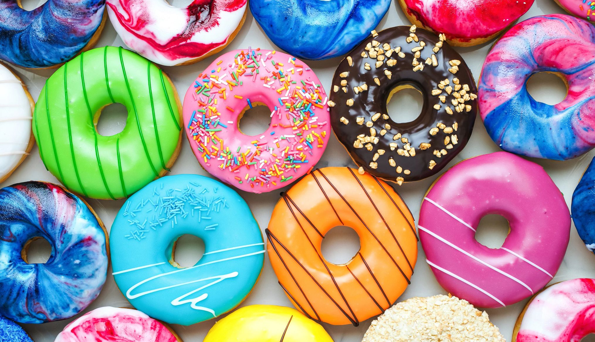 Donut Day Deals Assorted colorful donuts are pictured