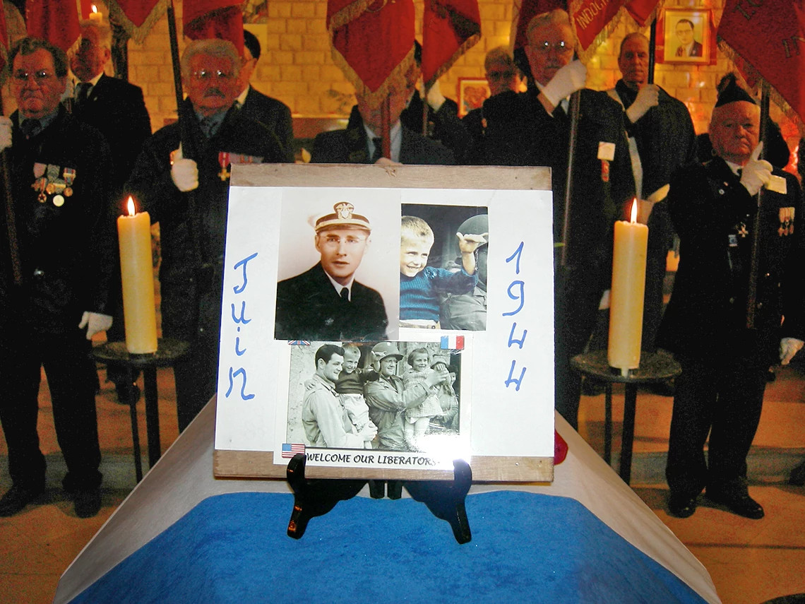 a photo of gilbert placed on his coffin