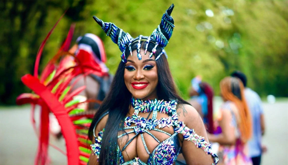 a dancer in an orange dress