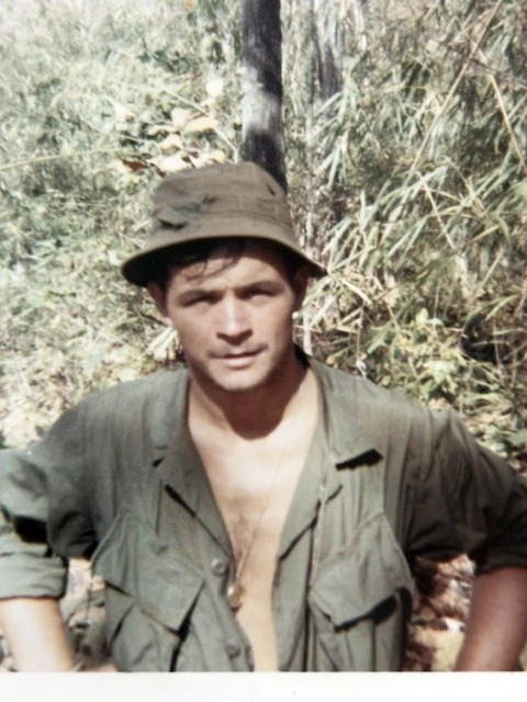 john west wearing green army fatigues in vietnam