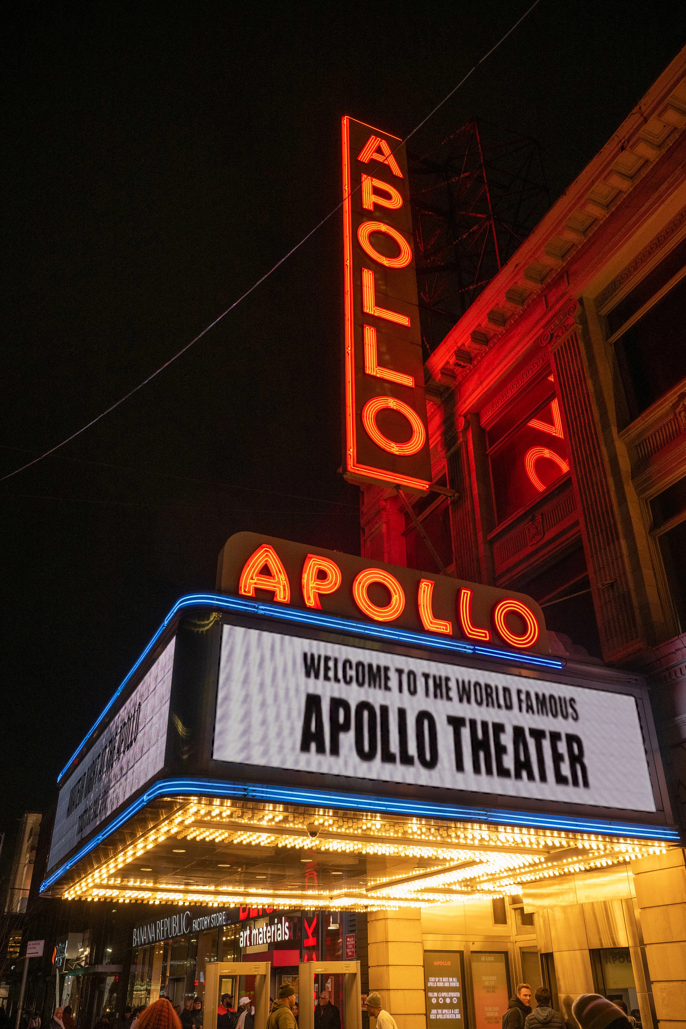 Signage of The Apollo shining at night
