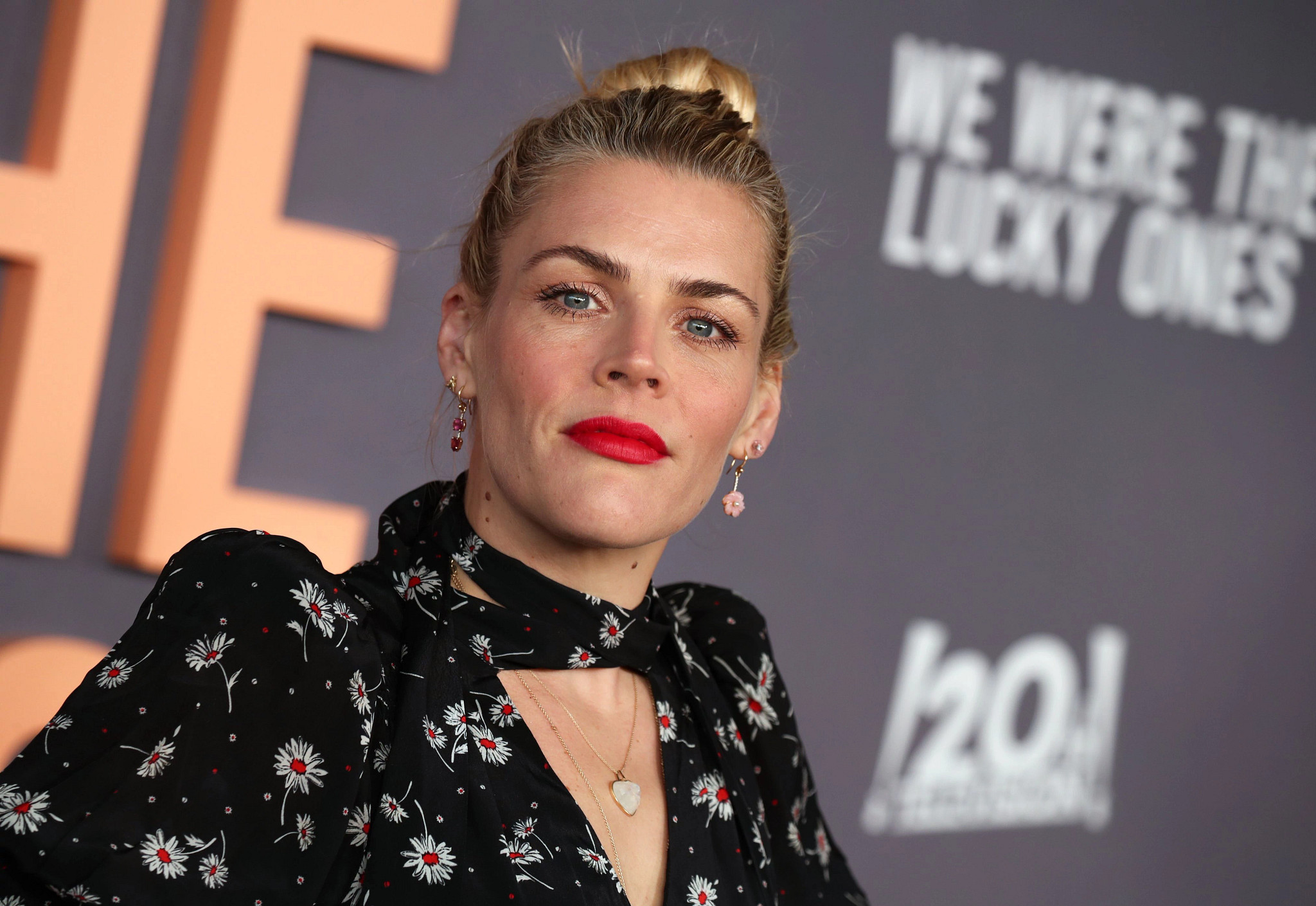Busy Philipps with a neutral expression