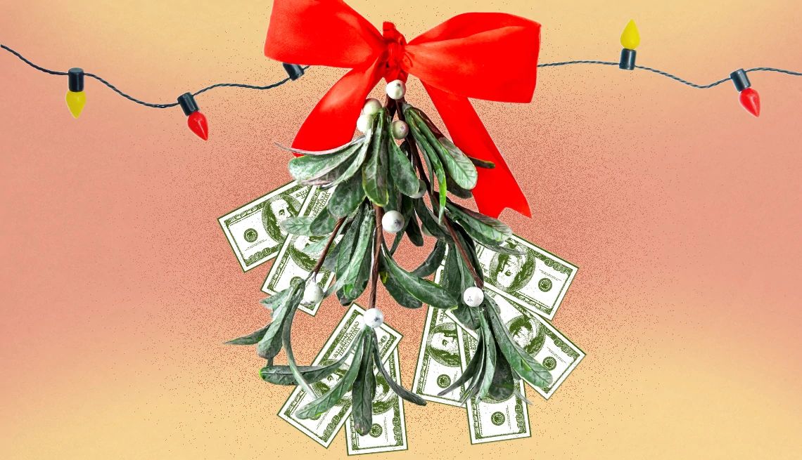 Holiday Shopping Gets More Expensive a bushel of hundred dollar bills hangs from holiday lights and a bow