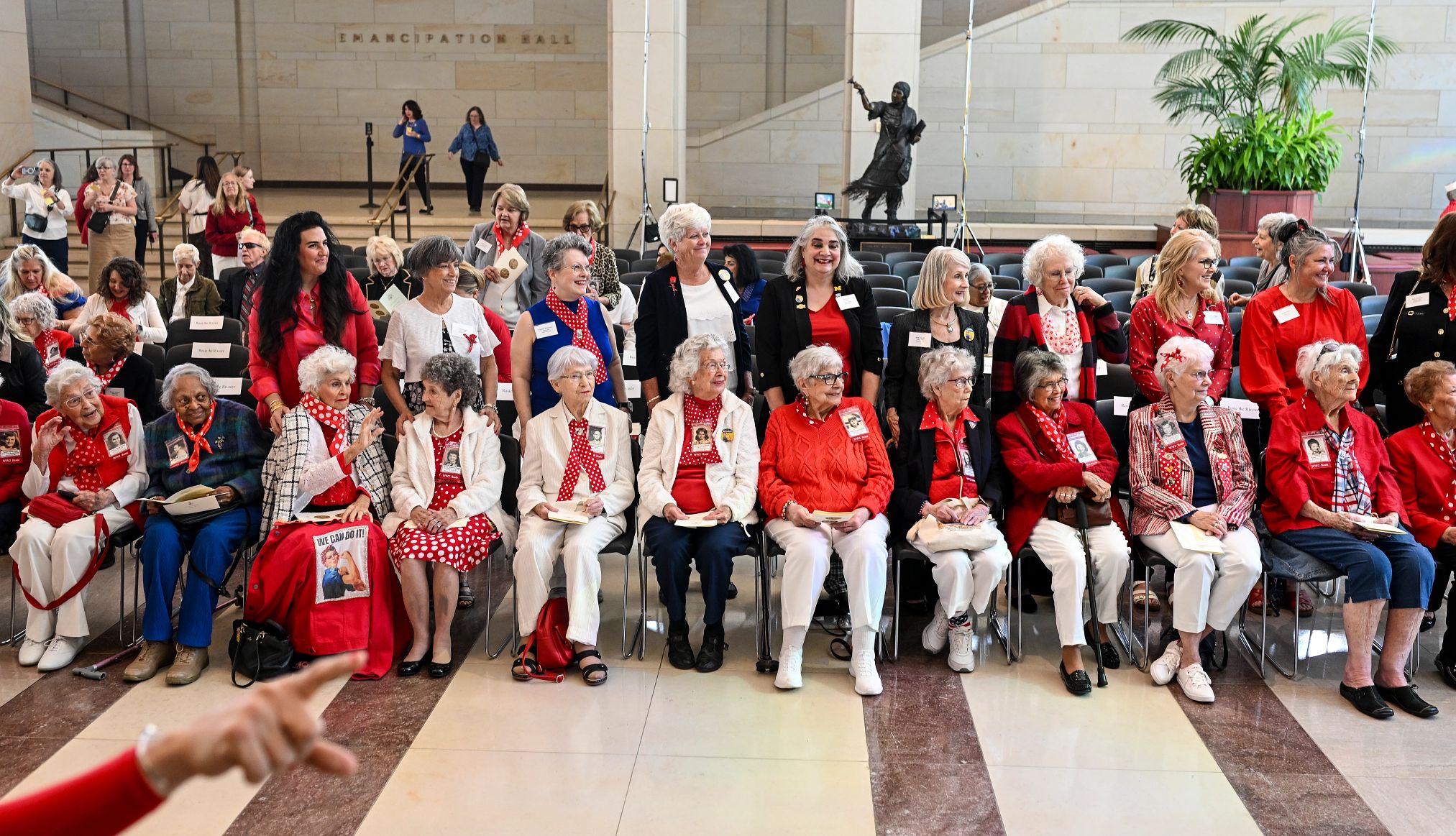 Rosie the Riveters A group of women dressed in red, white and blue .