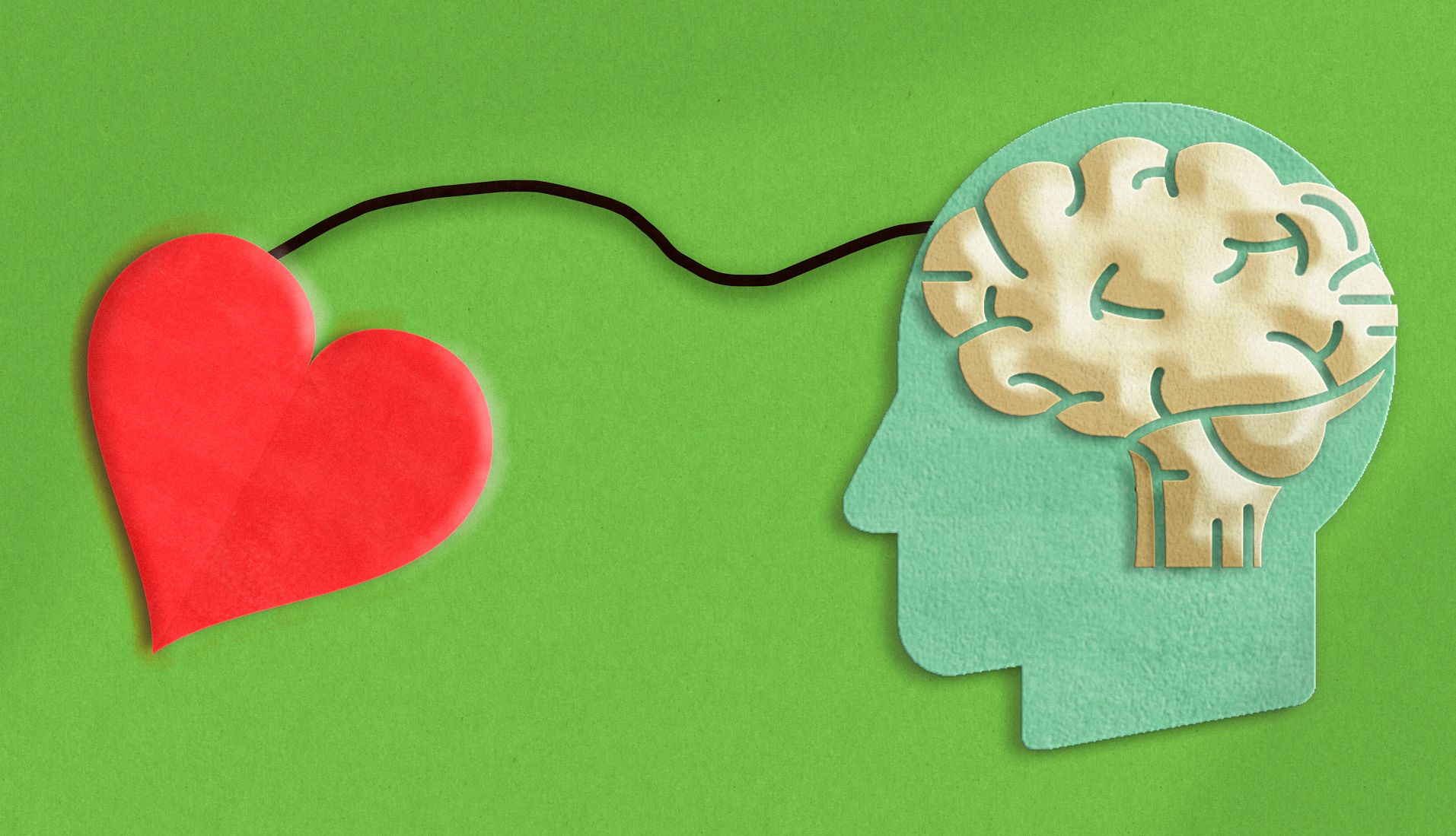 Keeping your blood pressure in check can reduce your risk of dementia A concept of a paper-cut heart and paper-cut brain connected by a string on a green background