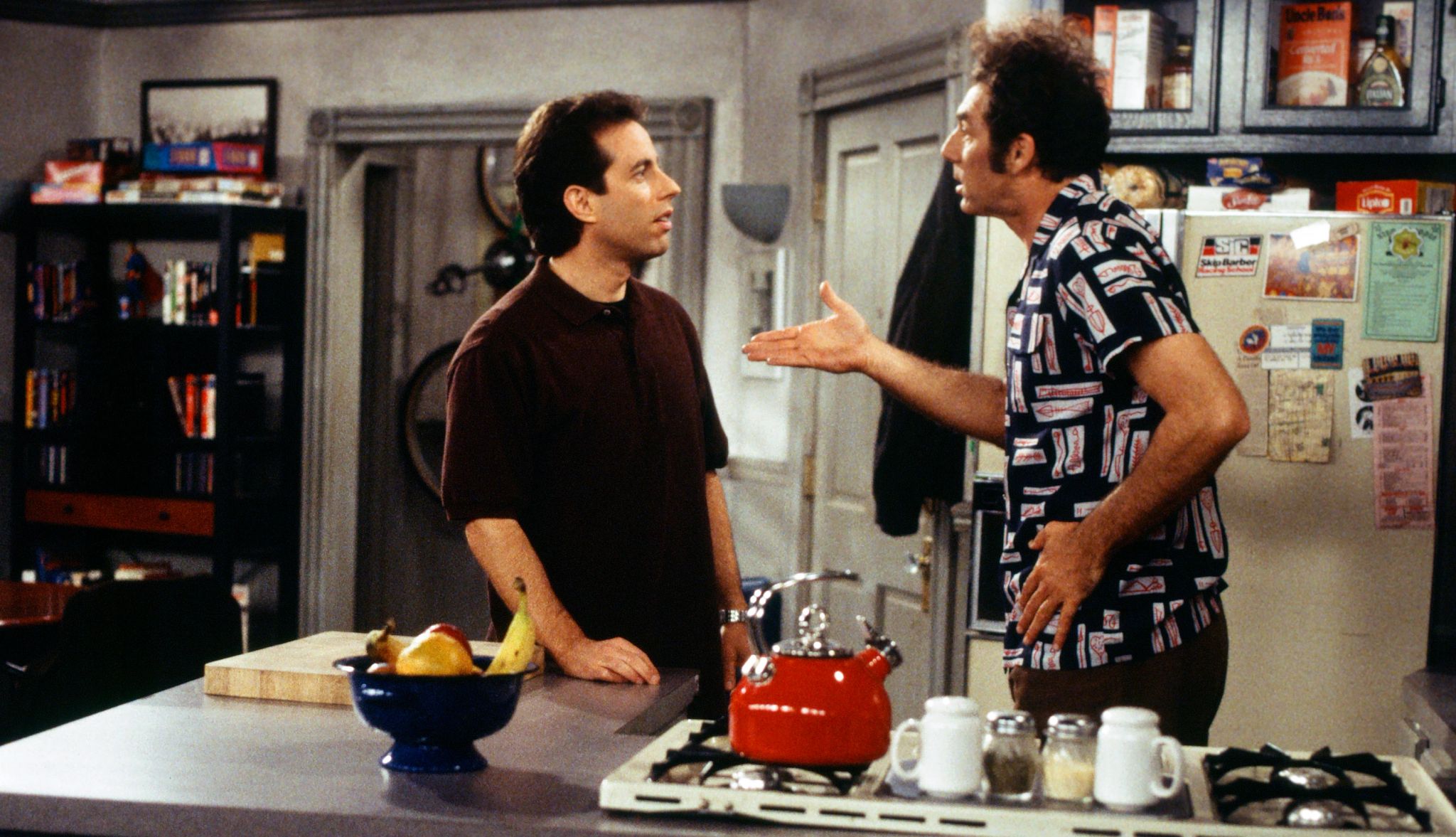 Michael Richards played Cosmo Kramer on 'Seinfeld' Jerry Seinfeld with Michael Richards as Cosmo Kramer in kitchen in a still from Seinfeld