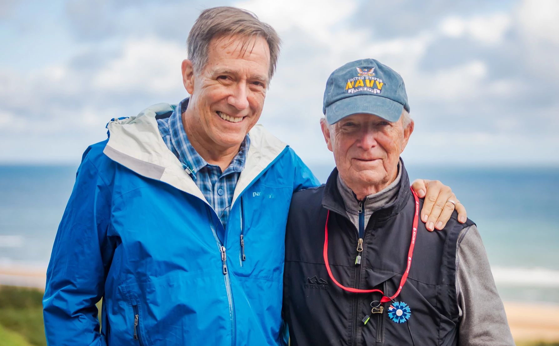 David Martin two older men smile at the camera