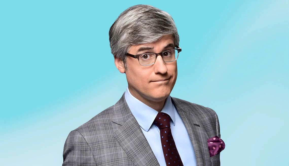 Mo Rocca interview Mo Rocca against light blue ombre background
