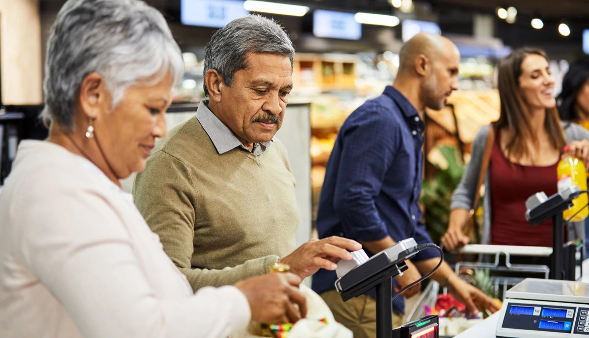 Couple buying groceries