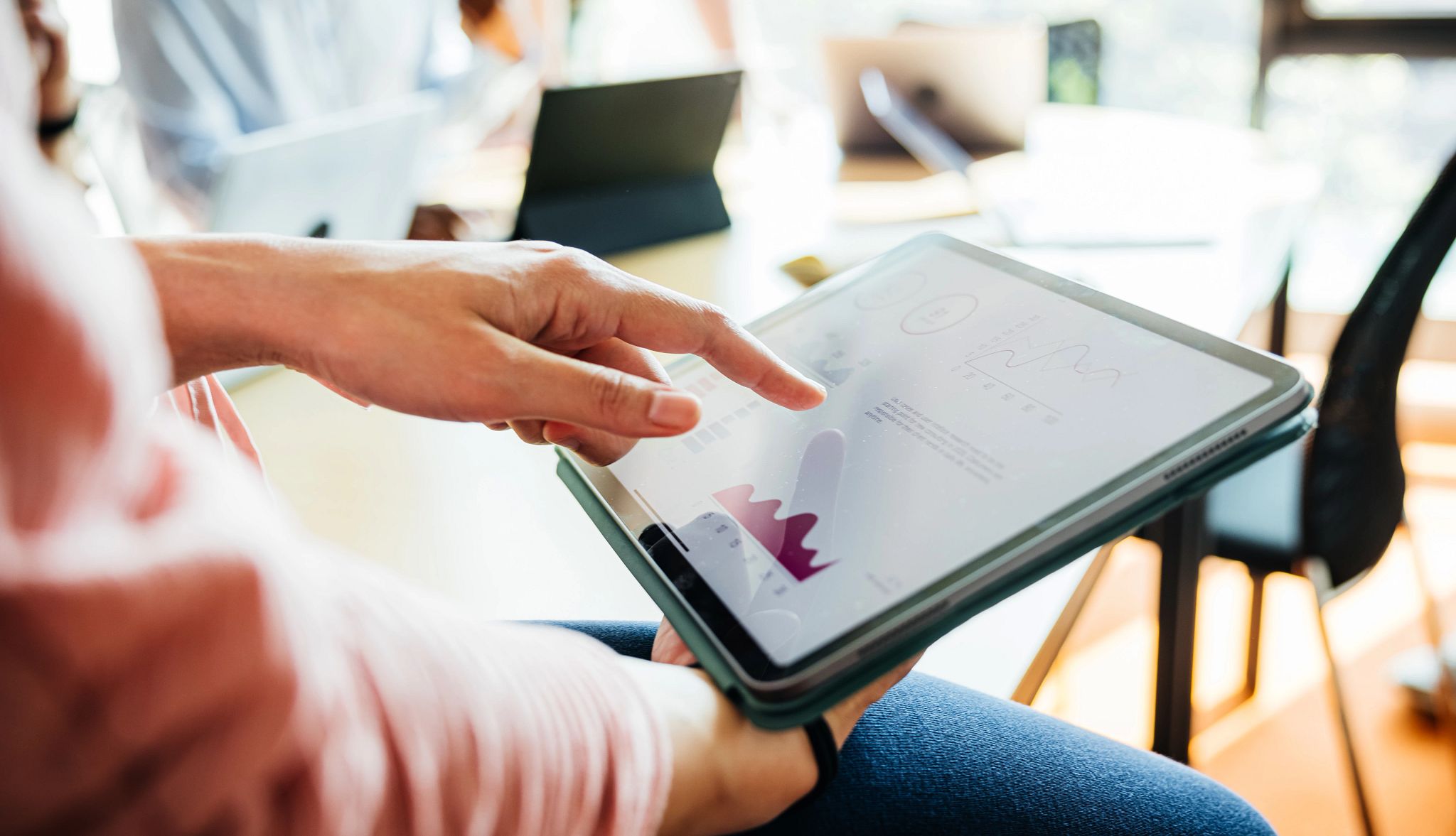 Guide to Buying a Vacation Home a person using a tablet