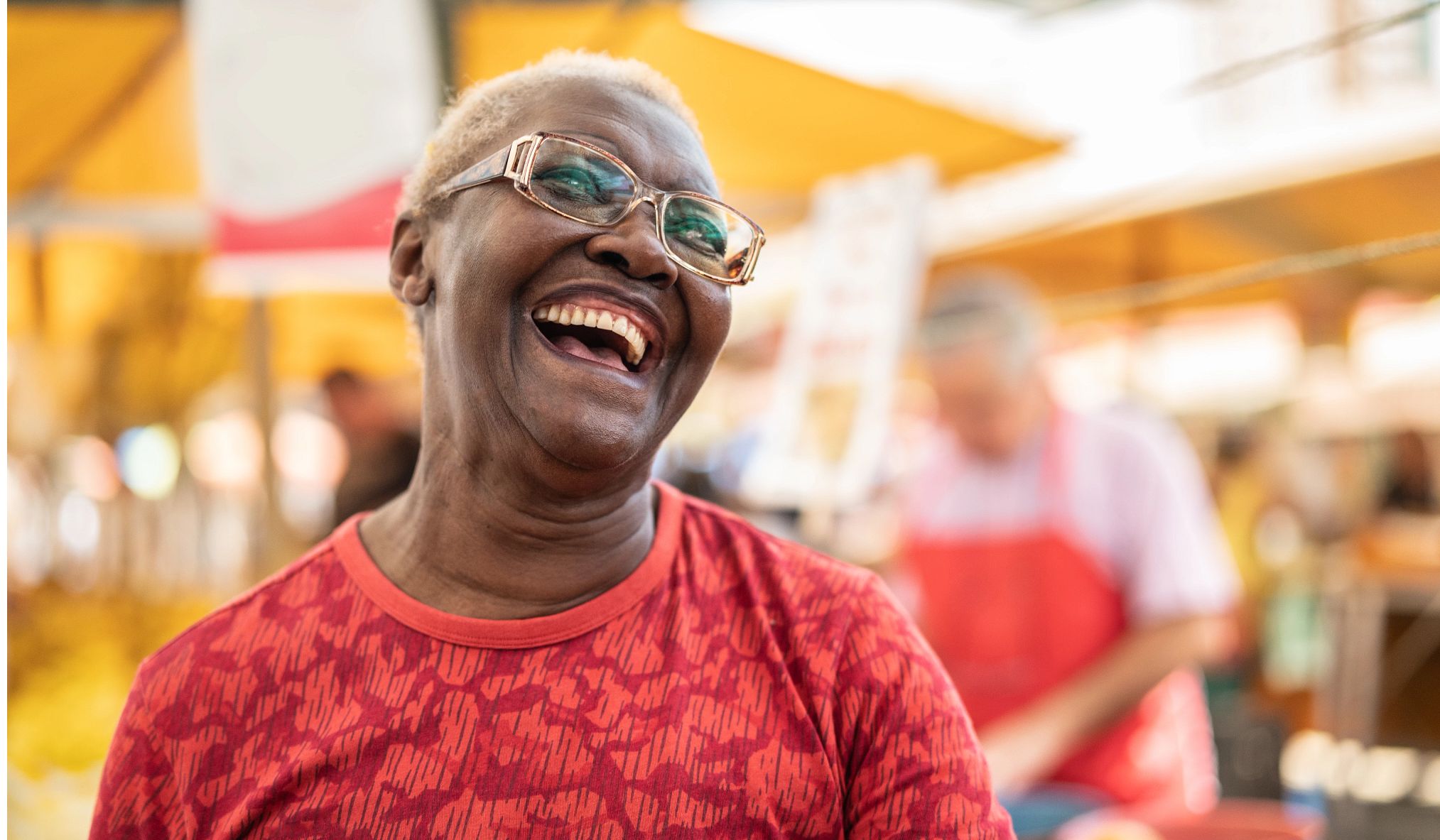 African American woman smiling at festival African American woman smiling at festival