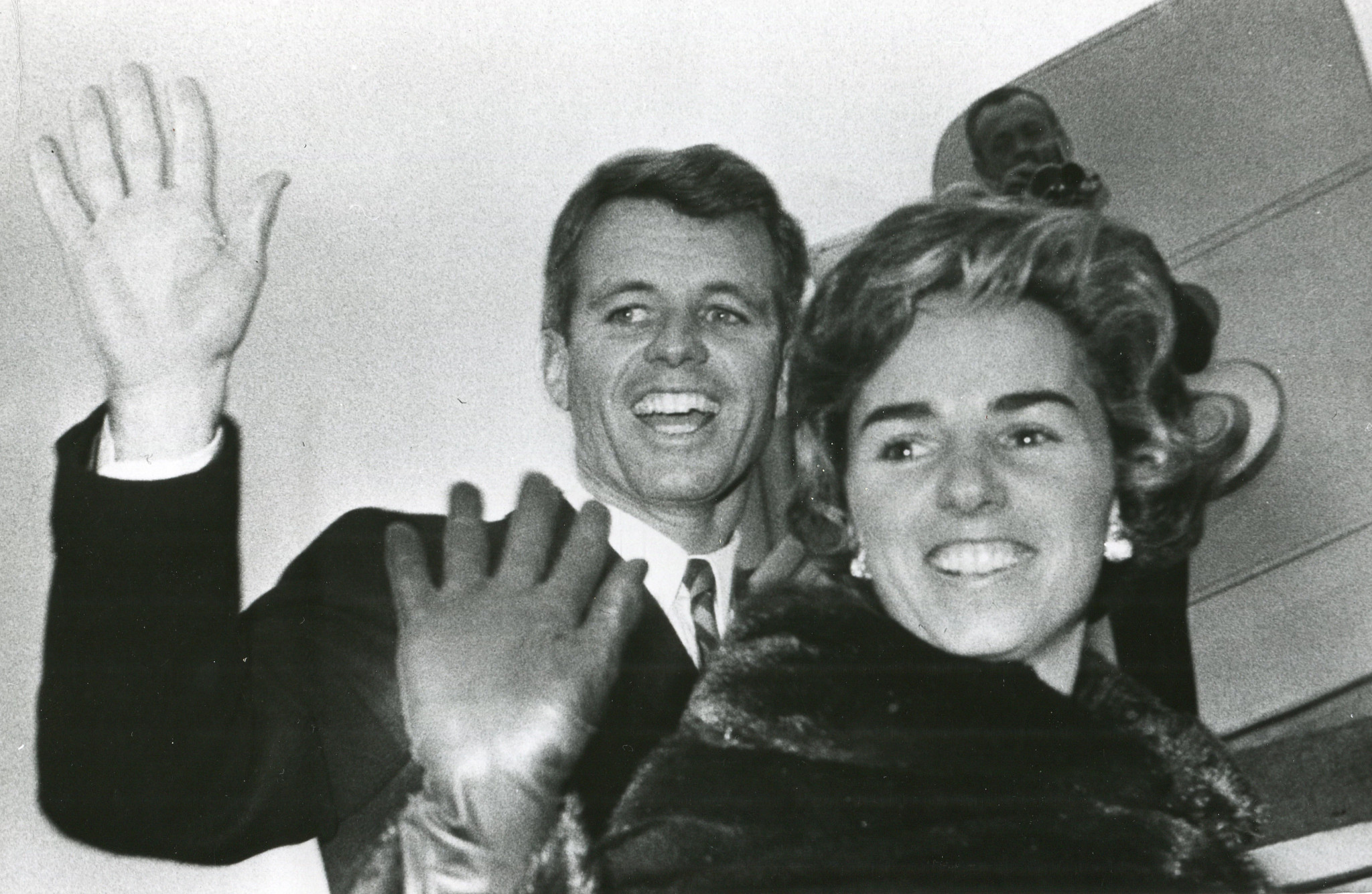 Robert Kennedy and Ethel Kennedy board a flight