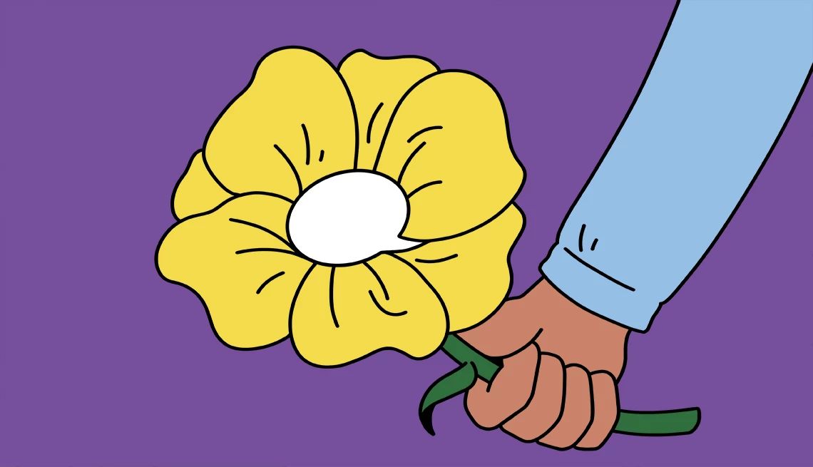 Ways to Make a Good Apology a hand holding a flower