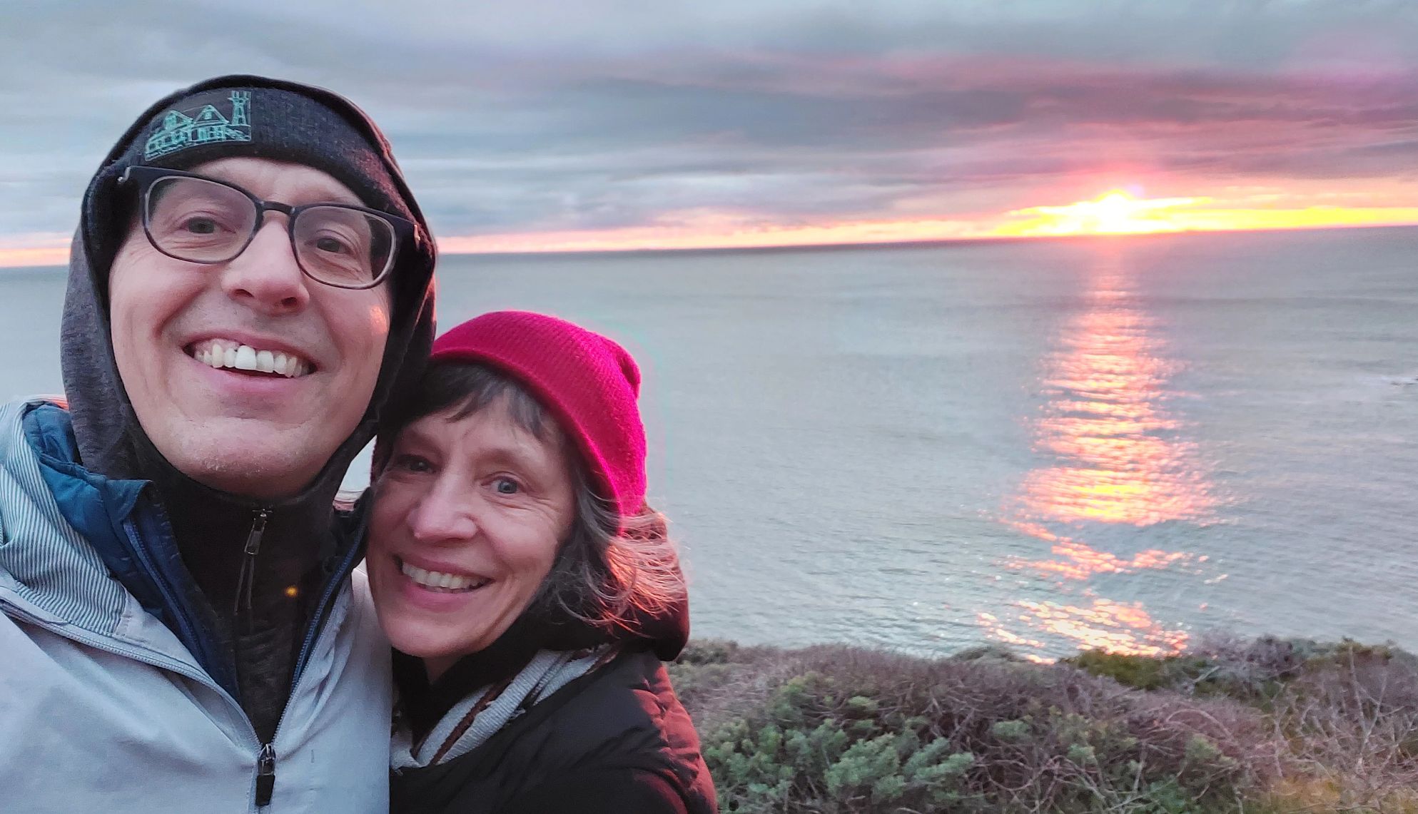 How to care for someone with heart disease Ed Frauenheim and Rowena Richie smile at the camera in front of a body of water.