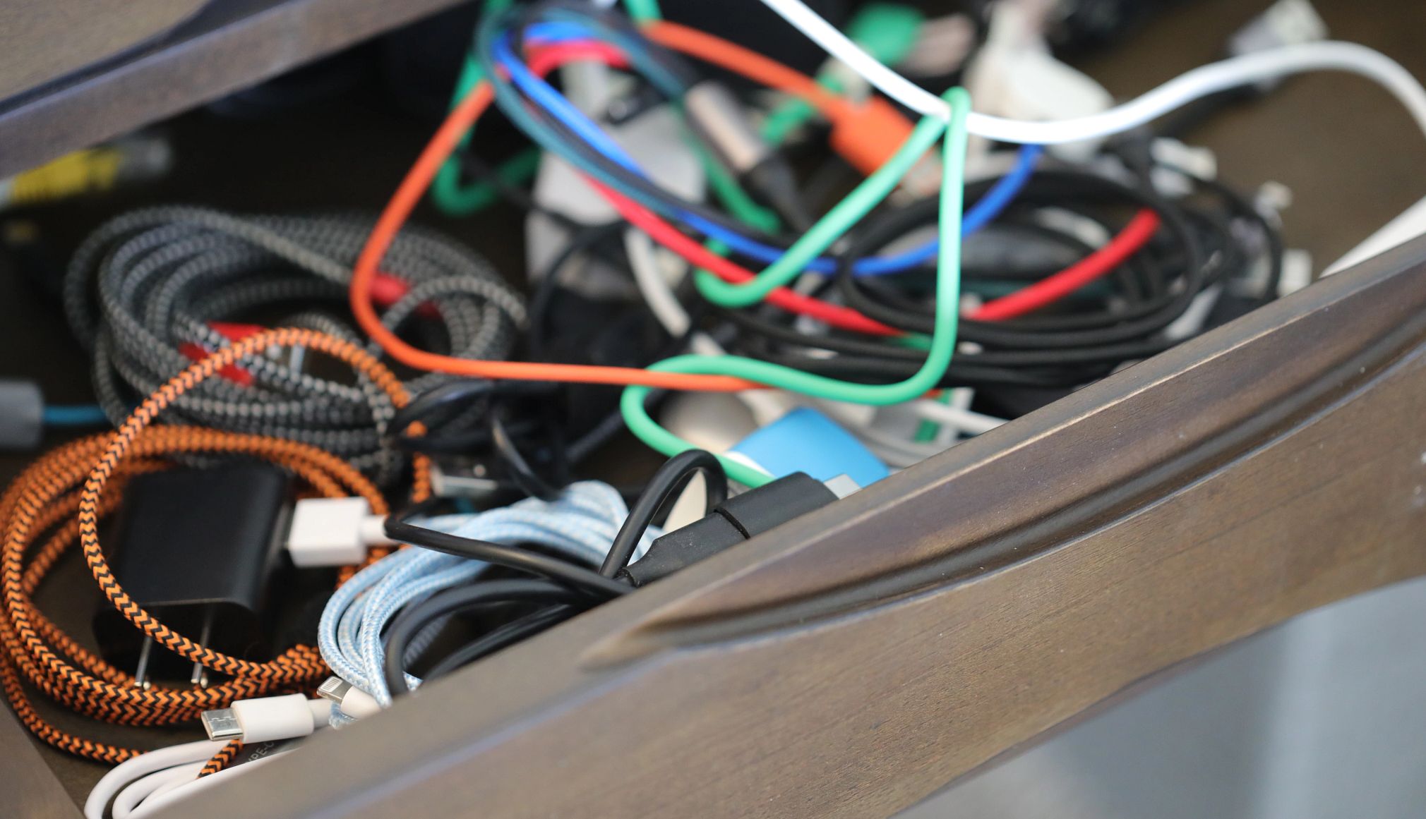 Find Cash in Your Old Cables a photo shows a drawer full of old cables