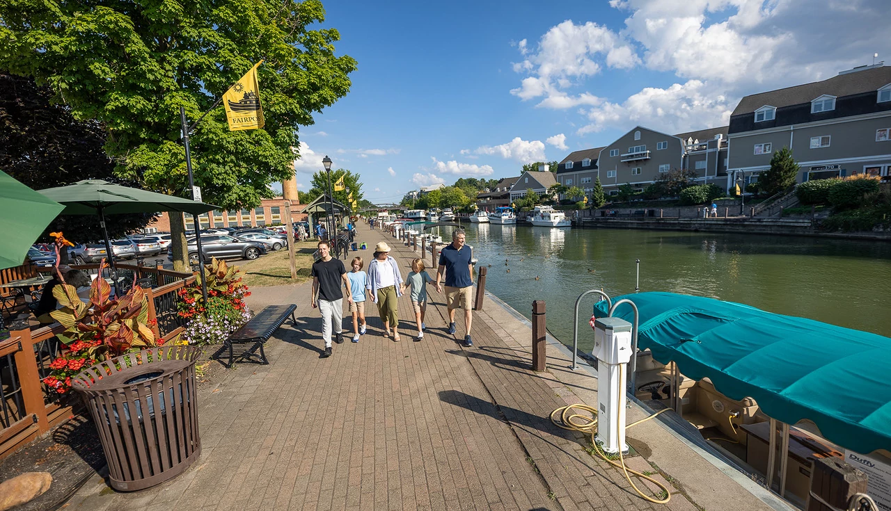 Village of Fairport canal people walking along the canal in the Village of Fairport
