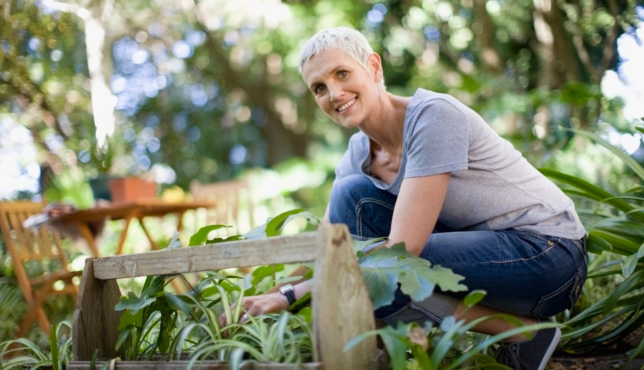 Woman in her vegetable garden Woman in her vegetable garden