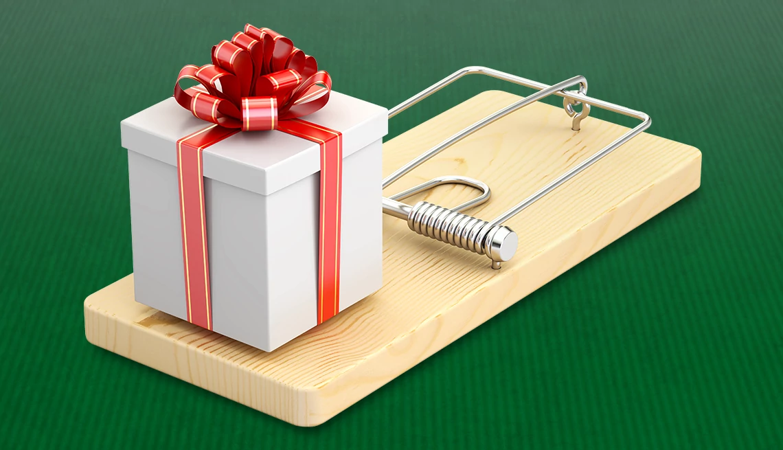 Regalo de navidad sobre una trampa para ratones