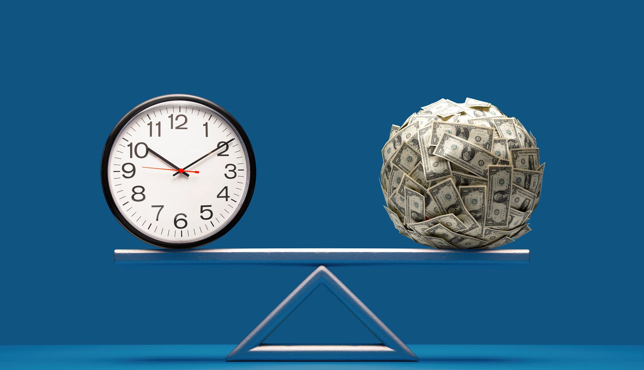 AARP Social Security Poll analog clock and ball of money equally balanced on seesaw weight scale on blue surface and background