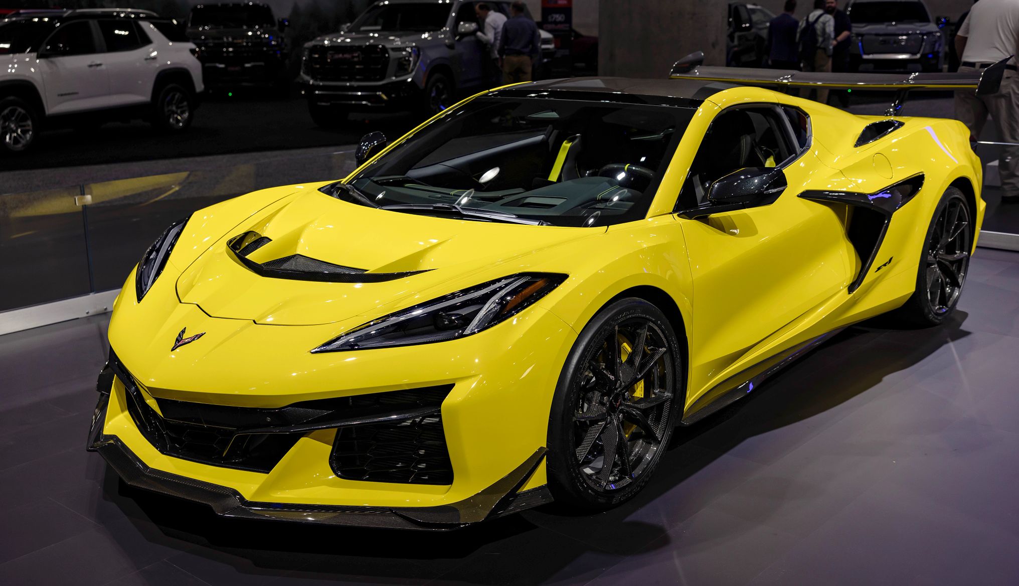 Best sports cars for older adults bright yellow sports car at an auto show