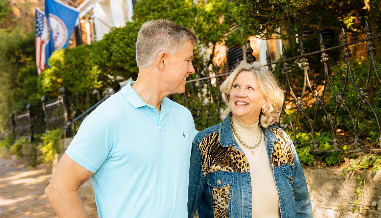 Dave and Jill Dalton moved from Charlotte, North Carolina to Abingdon, Virginia Dave and Jill Dalton standing outside in front of trees and building, staring at eachother