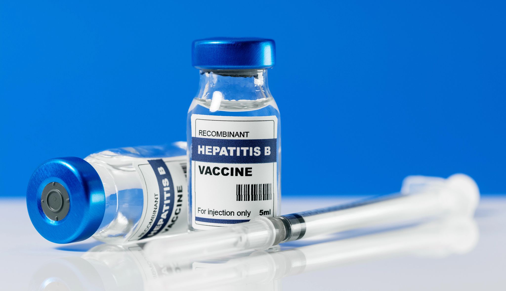 Vaccine Smart Guide vaccine vials and syringe