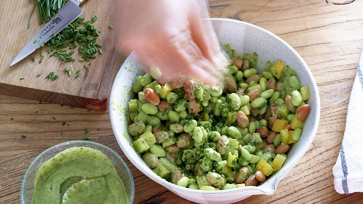 A close-up view of super-green edamame salad in a bowl