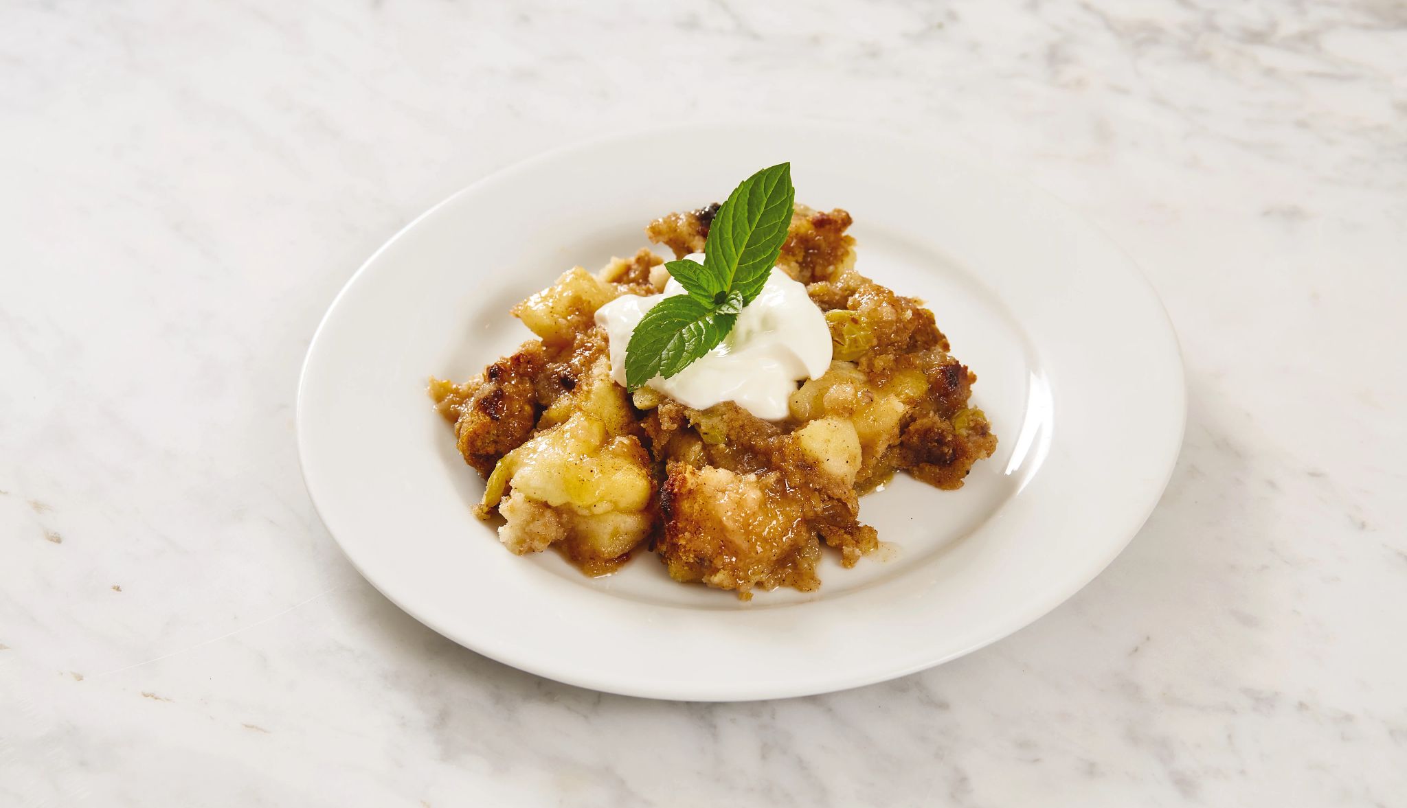 Apple-pear brown betty Apple-pear brown betty on small dish